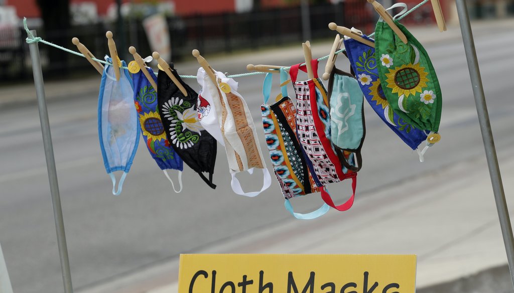 Homemade face masks for sale blow in the wind outside of a business, Tuesday, May 12, 2020, in San Antonio. San Antonio continues to encourage face masks or coverings as well as social distancing in an an effort to fight the coronavirus pandemic. (AP)