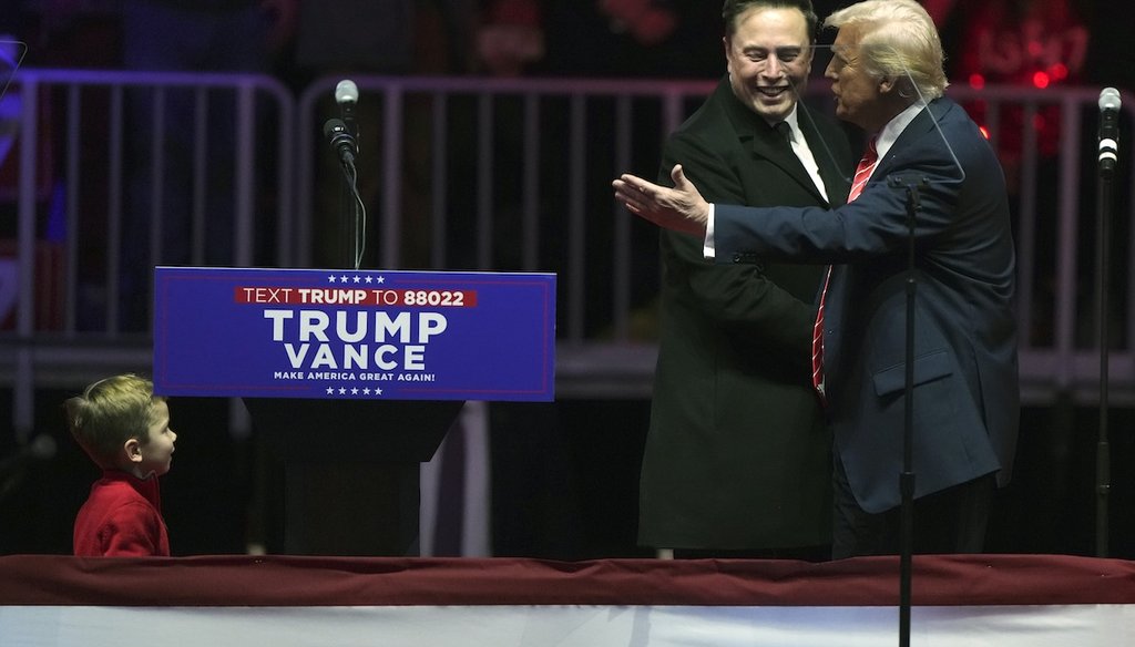 Elon Musk, with his son X Æ A-Xii, arrives on the dais with President-elect Donald Trump, at a rally ahead of the 60th Presidential Inauguration, Jan. 19, 2025, in Washington. (AP)