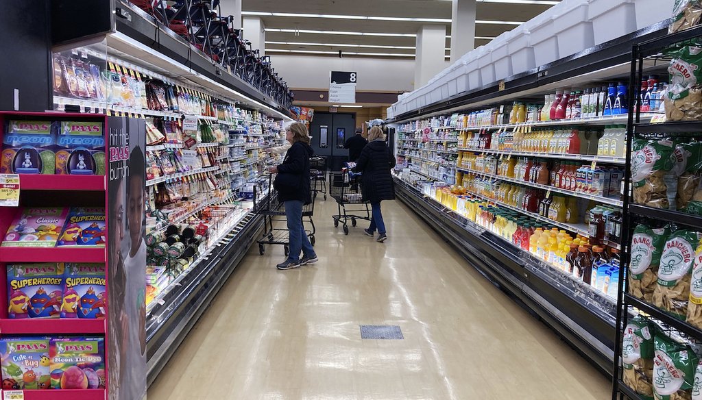 Customers shop at a grocery store in Mount Prospect, Ill. Food inflation is taking a toll on family budgets. (AP)