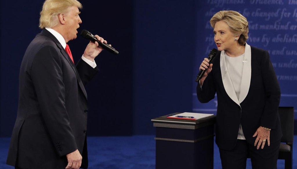Republican presidential nominee Donald Trump and Democratic presidential nominee Hillary Clinton speak during the second presidential debate at Washington University in St. Louis on Oct. 9, 2016. (New York Times)